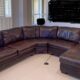 Large dark brown leather 4 piece sectional with right arm facing chaise